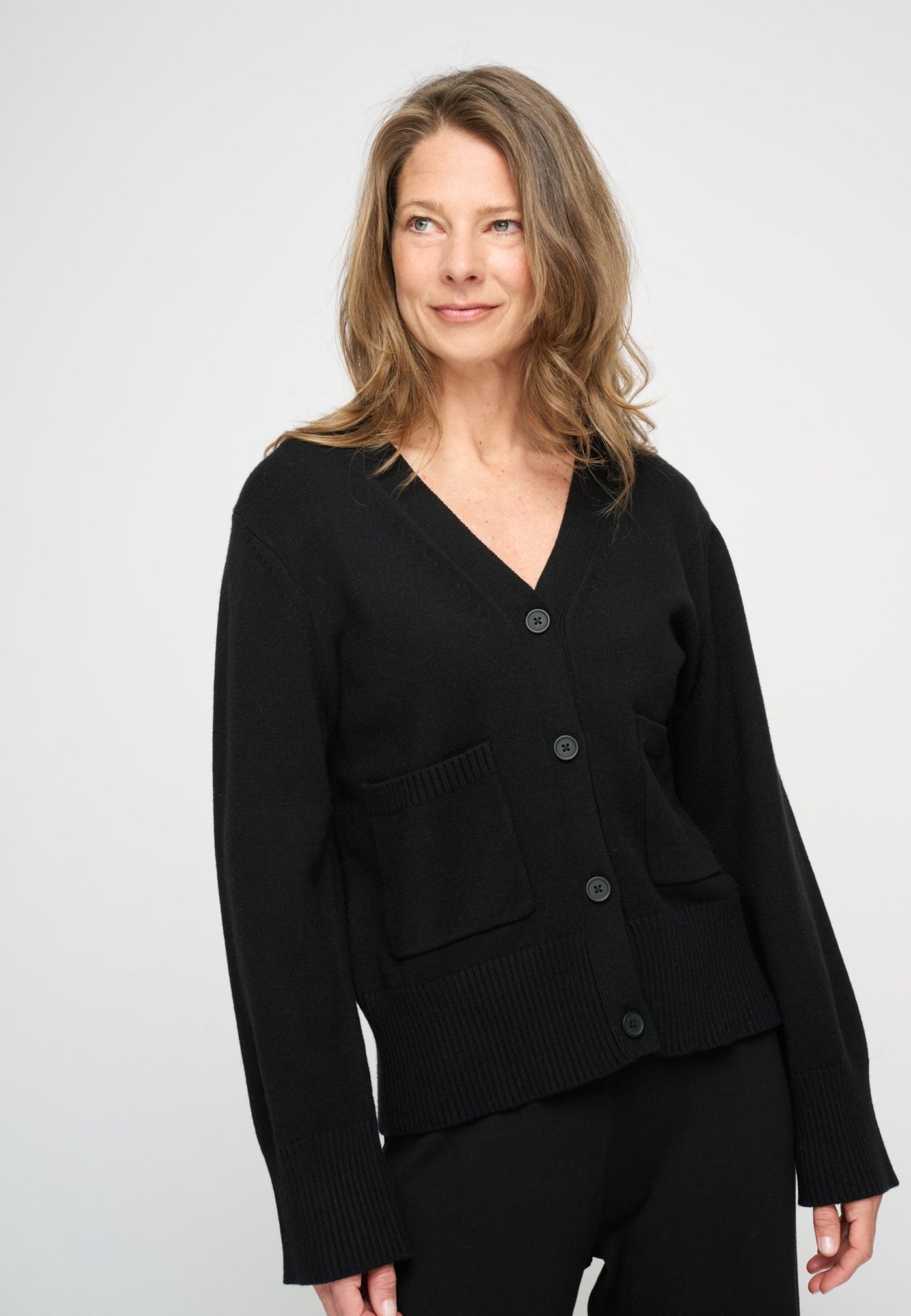 トップス soduk drawing knit cardigan / black soduk（スドーク）の「stitch knit cardigan（カーディガン